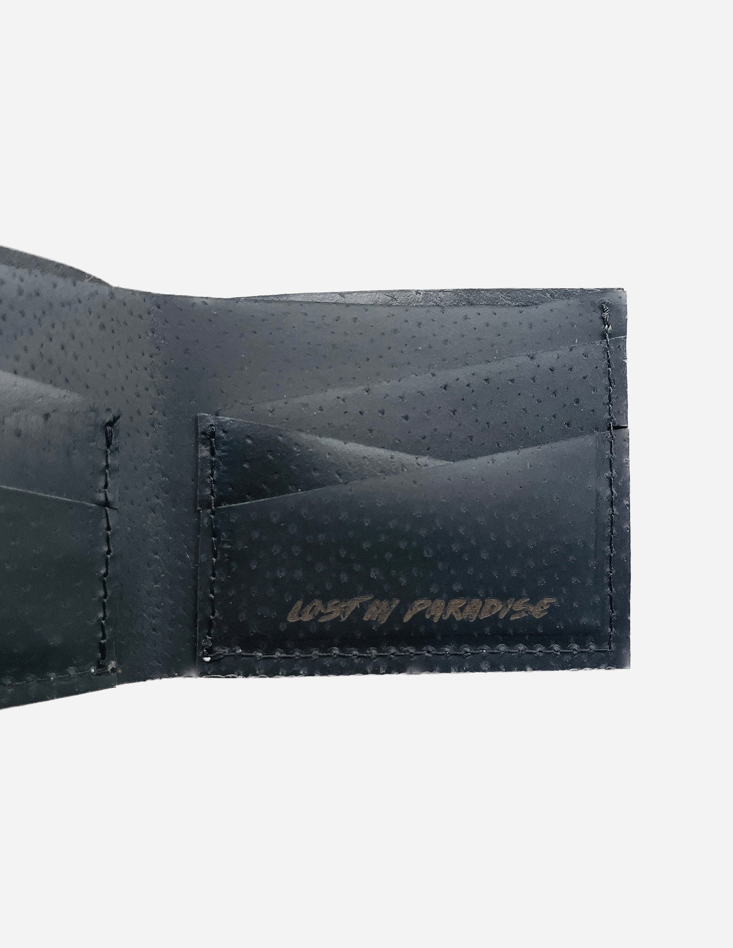 Hand made men’s brown leather wallet with Puro Paradise logo